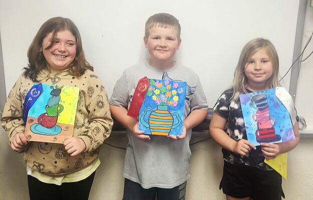 Central High Elementary students who earned ribbons for their art projects in the “Whimsical Wonders” category at the first “Art-Rageous Student Art Show” (left to right) are: Kara Poplin, 1st; Jake Johnson, 2nd; and Averie Severtson, 3rd.