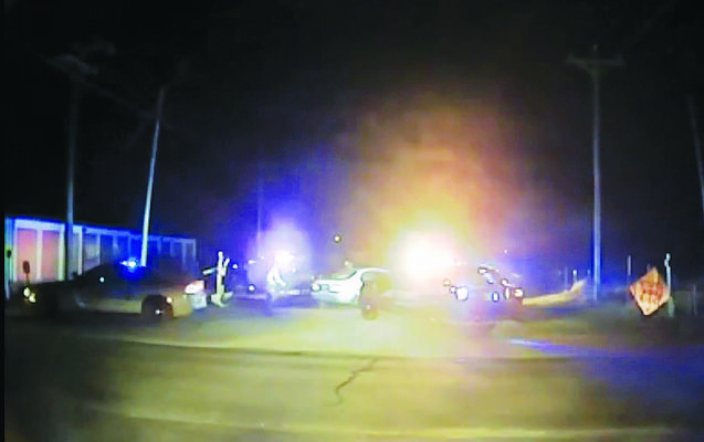 High-speed pursuit: Dashcam footage from the Stephens County Sheriff’s Department shows the suspect vehicle, center, reversing to avoid being boxed in by law enforcement vehicles and narrowly missing striking an officer.