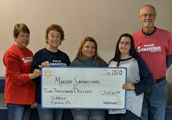 WAL-MART grant of $2,000 was recently presented to the Marlow Samaritans. Shown above accepting the donation are, l-r, Carolyn Lowe, Sue Cramton, Cathy Hamer, Wal-Mart area manager, and Theresa Johnson, Wal-Mart Human Resources coordinator of Wal-Mart Jewelry #8866, and Bobby Cobb.