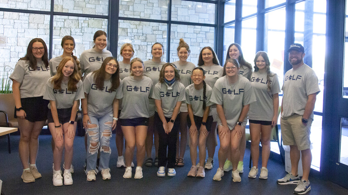 Marlow Lady Outlaws gather for a photo in the elementary north campus lobby after a good luck parade as they head to the state championship competition.