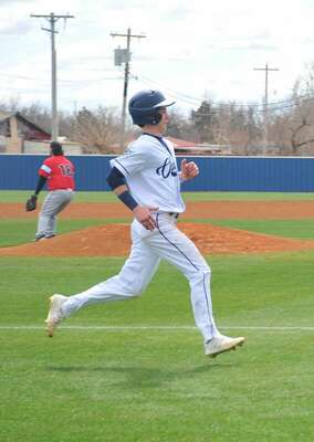 Kole Seeley scores on a line drive double to center by Will Bergner at Friday’s game against Purcell.
Photo by Elizabeth Pitts-Hibbard/The Marlow Review