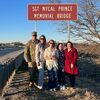 From left, General Colby Wyatt and his wife, Niki, Surana and her daughter, Raelynn, and Sen. Jessica Garvin, gather beneath the new sign honoring the late Sgt. Mycal Prince, for the
Memorial Bridge dedication held Friday, Jan. 27, 2023. Prince of Ninnekah
was killed in
Afghanistan, Sept. 15, 2011.
Photo Courtesy of Sen. Jessica Garvin