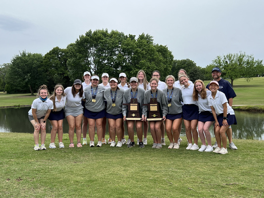 The entire Lady Outlaws golf team shows off their 3A State Championship Awards. Coach Mikey Eaves guided them to victory this year. 
Photo by Kenlee Wilson/Kenlee Wilson Photography