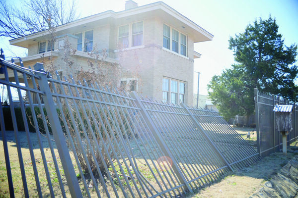 A steel fence at the W.T. Foreman Prairie House, 814 W. Oak Ave., leans over after derecho winds roll through Duncan Sunday night, causing plenty of damage in the community. Photo by Toni Hopper/The Marlow Review