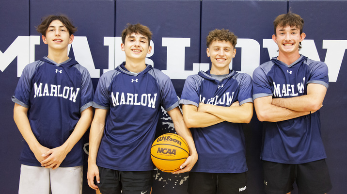 Marlow High School’s Boys Basketball team will host the pre-game football dinner from 5 to 7 p.m. Friday, Sept. 22, in the elementary cafeteria. From left, Peyton Powell, Kagun Mahaffey, Zach Long and Mason Holding represent for the team during off-season practice Monday, Sept. 11. 
Photo by Toni Hopper/The Marlow Review