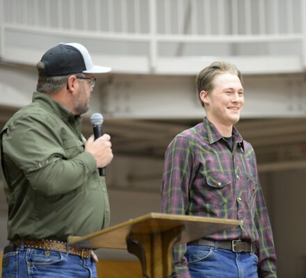 Kenny Baker gets MHS FFA member Noah Vanston into the auction mood during the annual labor auction, Dec. 1, 2022. Baker served as auctioneer, but is also president of the Ag Booster Club and a parent. His son, Korben Baker is an FFA officer. Photo by Toni Hopper/The Marlow Review