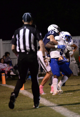 Marlow’s Barron Gage (13) takes down Dickson’s Jailyn Clark (5) during the 2nd quarter at Outlaw Stadium on Friday, during week 6. Marlow won 40-0. Photo by Toni Hopper/The Marlow Review