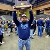 Marlow Coach Andy Howington lifts up the state trophy after Marlow’s Class 3A State win Feb. 17, 2024.