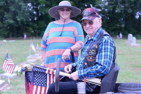 Earl Lavey, 75, and his wife, Pat, of Marlow, have been placing small memorial American flags on the grave sites of service members for years during Memorial Day weekend. Lavey is one of five remaining members of the Marlow chapter of the American Legion. More members are desperately needed to maintain the chapter's official status. Photo by Toni Hopper/The Marlow Review