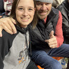 Steve and Kirsten Terrell's daughter, Makenzie, with Toby at a Bedlam basketball game.