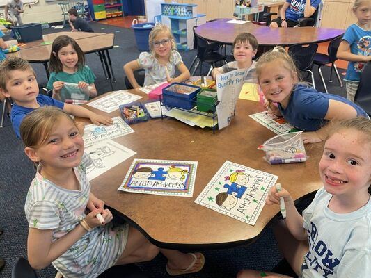 In the group photo from left, clockwise, Casslyn Norton, Maddox Wilkerson, Jae Davis, Landon McCarley, Maddox Dahl, Kimber Johnson and Emersyn White work on their coloring pages. Photo Submitted by Kim Kizarr